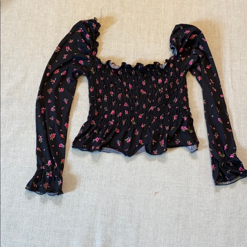 Dolls Kill smocked long sleeved crop top.